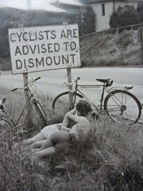 Cyclists obeying the law of the road, circa 1969.