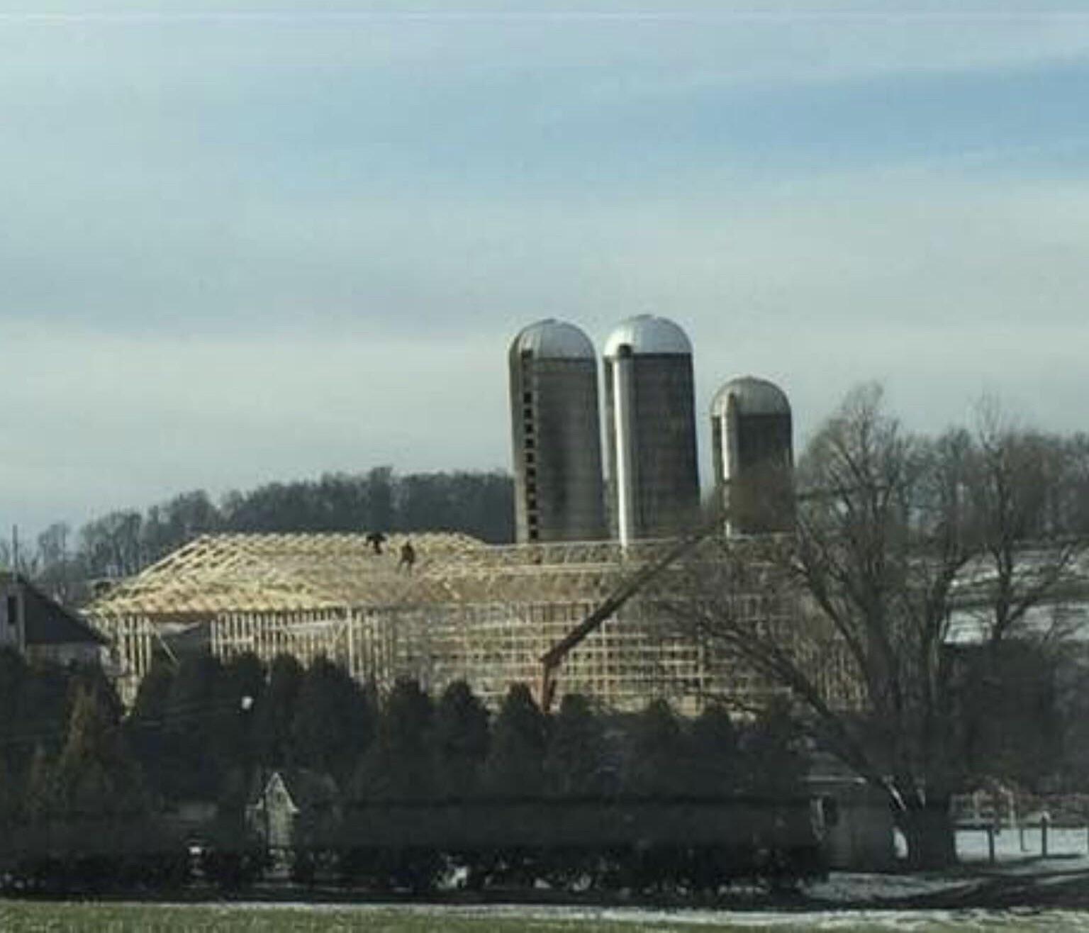 Amish rebuilding 36hrs after a barn fire.