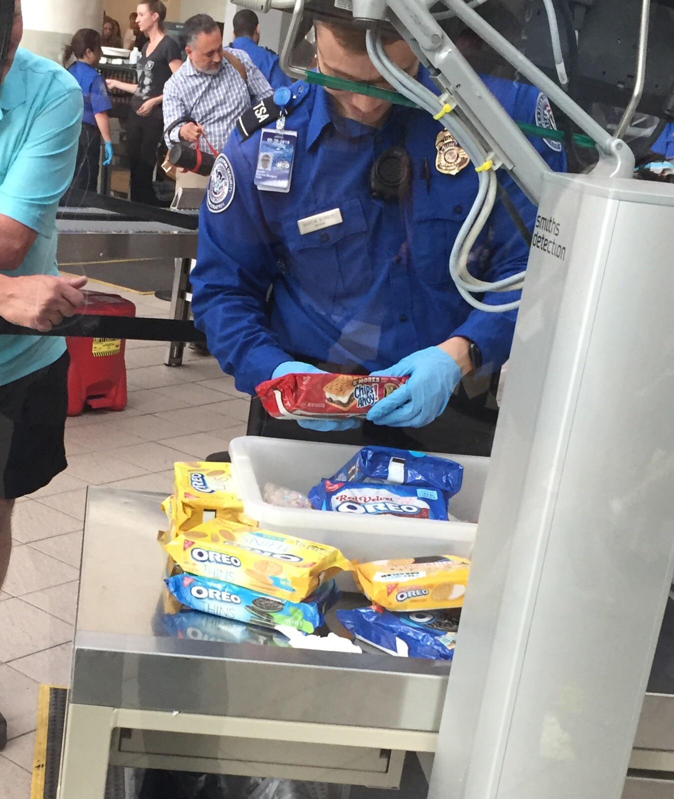 That time I saw someone try to smuggle 50 boxes of cookies out of the Orlando Airport and was treated like a drug lord.