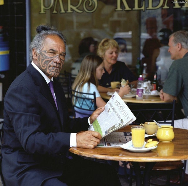 New Zealand Maori having a spot of breakfast before doing the Haka and showing his dominance over his enemies.