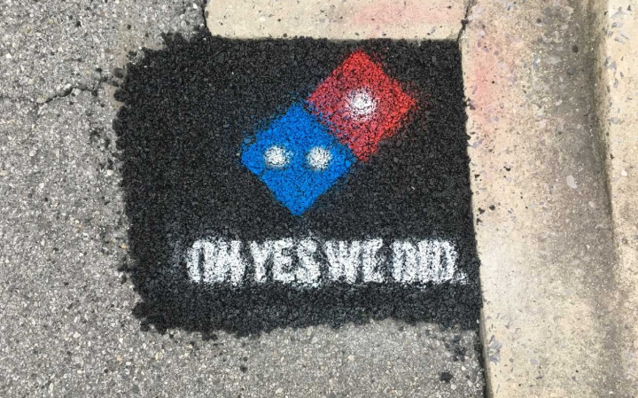 When Dominos paves the potholes because the city hasn't the time for such things.