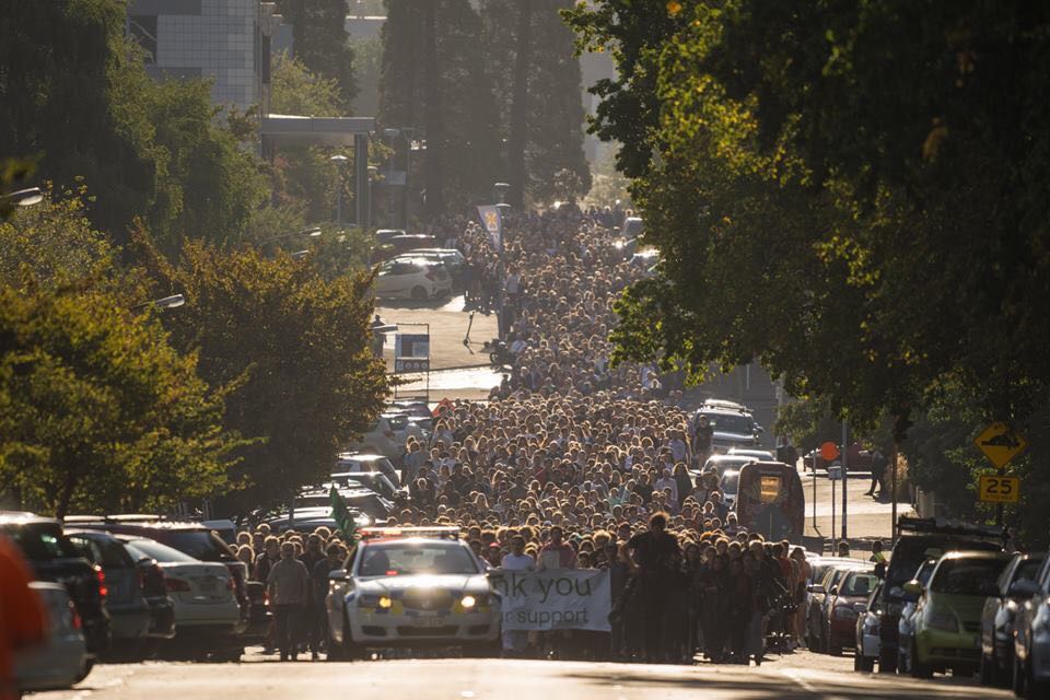 Students in Dunedin, NZ walk in silence. 