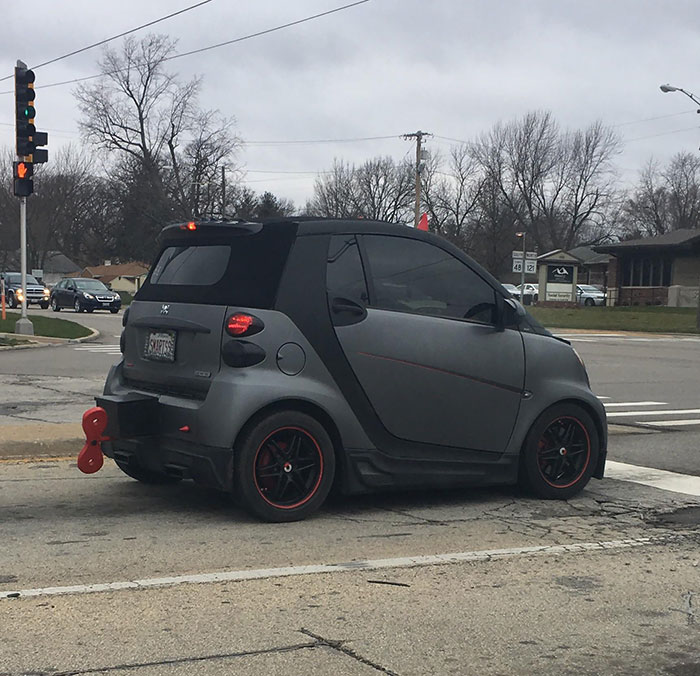 a smart car with a wind up add on