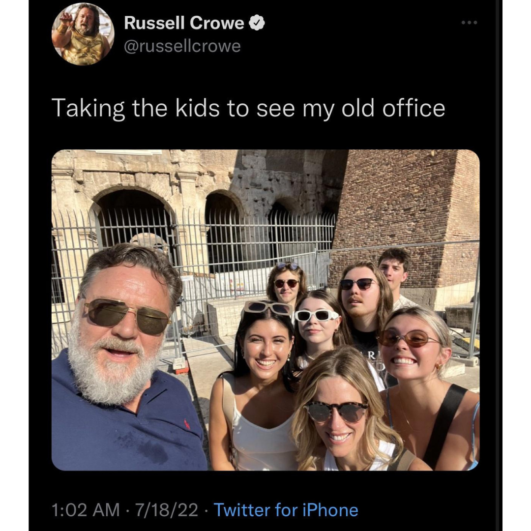 an image of russell crowe outside the coliseum with his kids